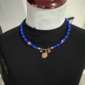 Necklace and earrings.